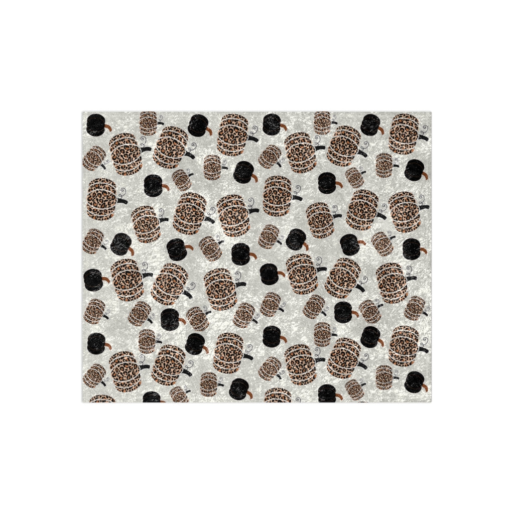 fall pumpkin blanket with leopard print and black pumpkin patter on white background