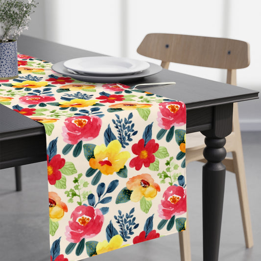 summer flower table runner with red, navy blue and yellow flowers on a white background.
