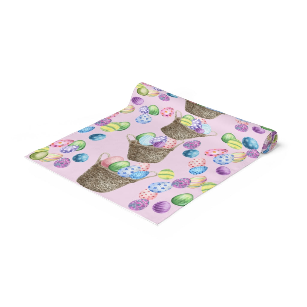pink easter table runner with blue, green, yellow and pink easter eggs 
