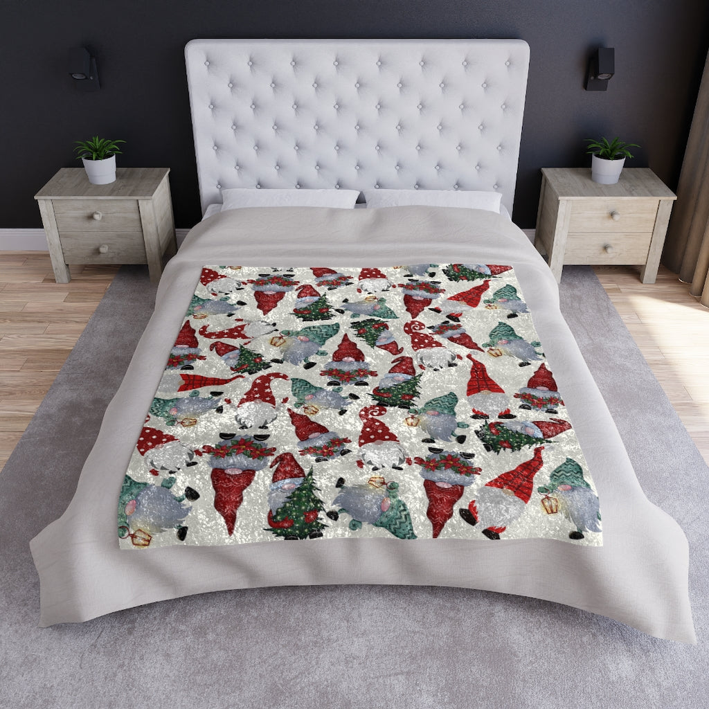 christmas gnome blanket displayed on a bed