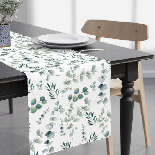 eucalyptus table runner with green leaves on a white background