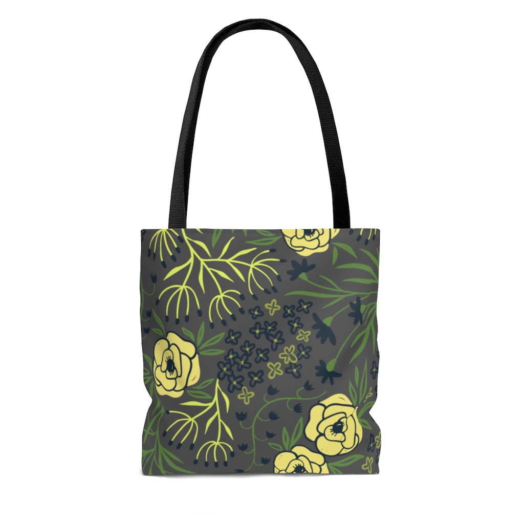 womens tote bag with yellow, navy blue, green floral on a gray background.